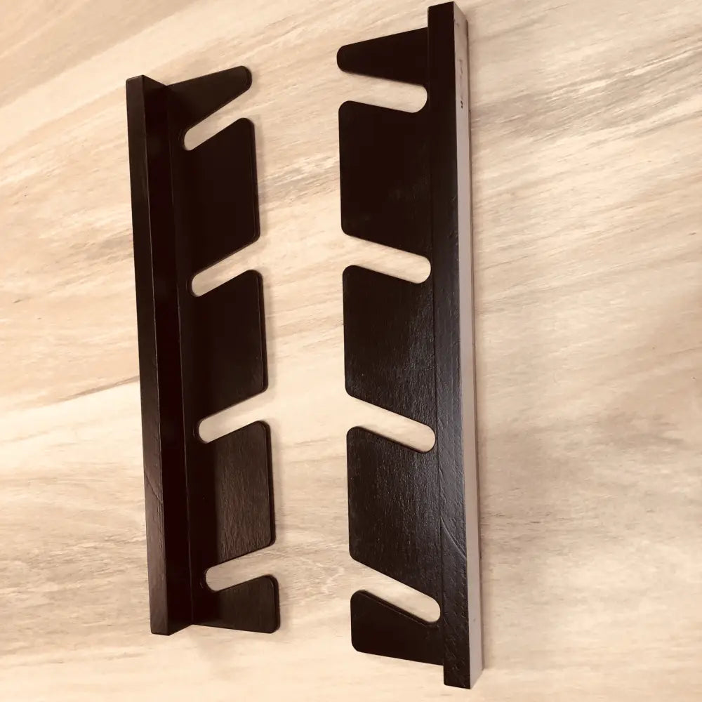 Black wooden knife block with sleek modern design and multiple slots for securely holding knives
