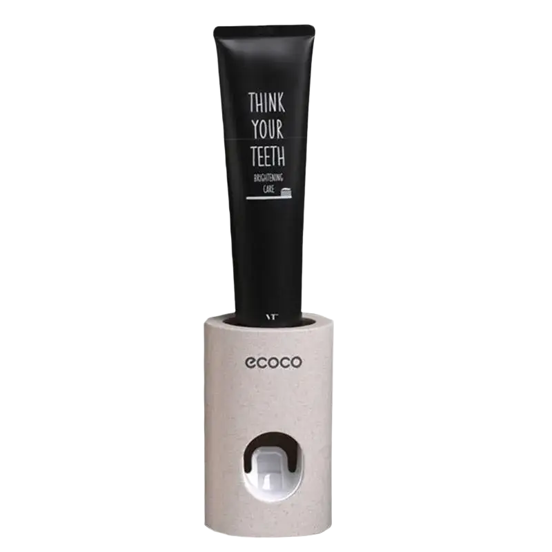 Black toothpaste tube labeled think your teeth in beige textured ecoco wall mounted toothpaste dispenser holder set