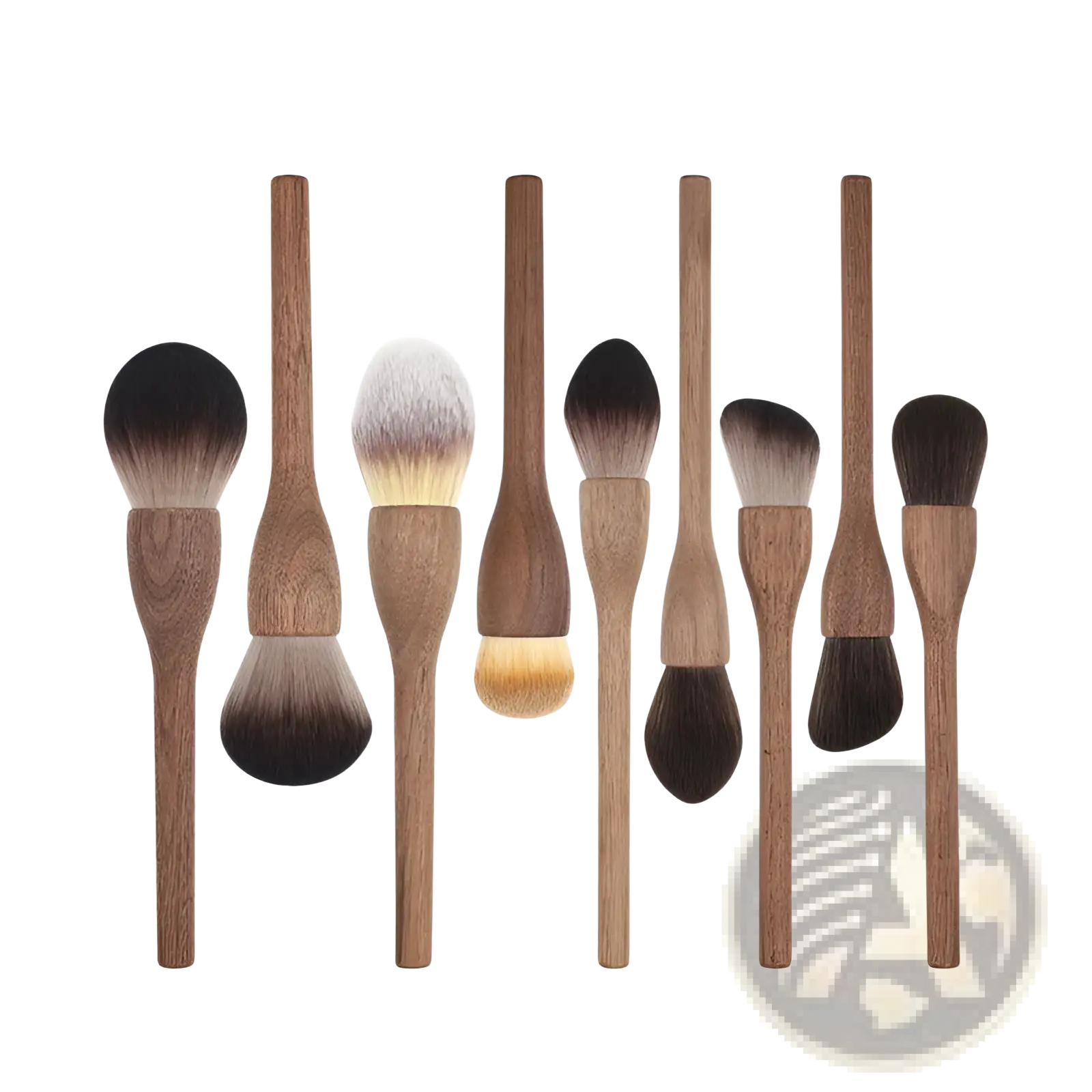 Set of eight walnut wood makeup brushes with wooden handles and soft natural fiber bristles in varying sizes and shapes
