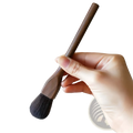 A sleek dark brown wooden-handled makeup brush with dense black fiber bristles from walnut wood set