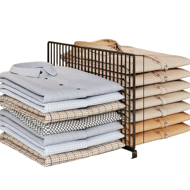 Black metal wardrobe divider organizer with vertical slats designed to neatly hold folded shirts in a closet