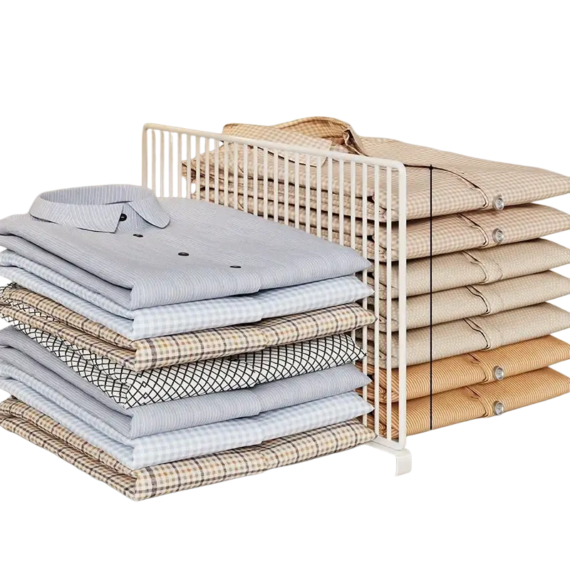 White metal wardrobe divider organizer with vertical slats and base holding neatly folded colorful shirts