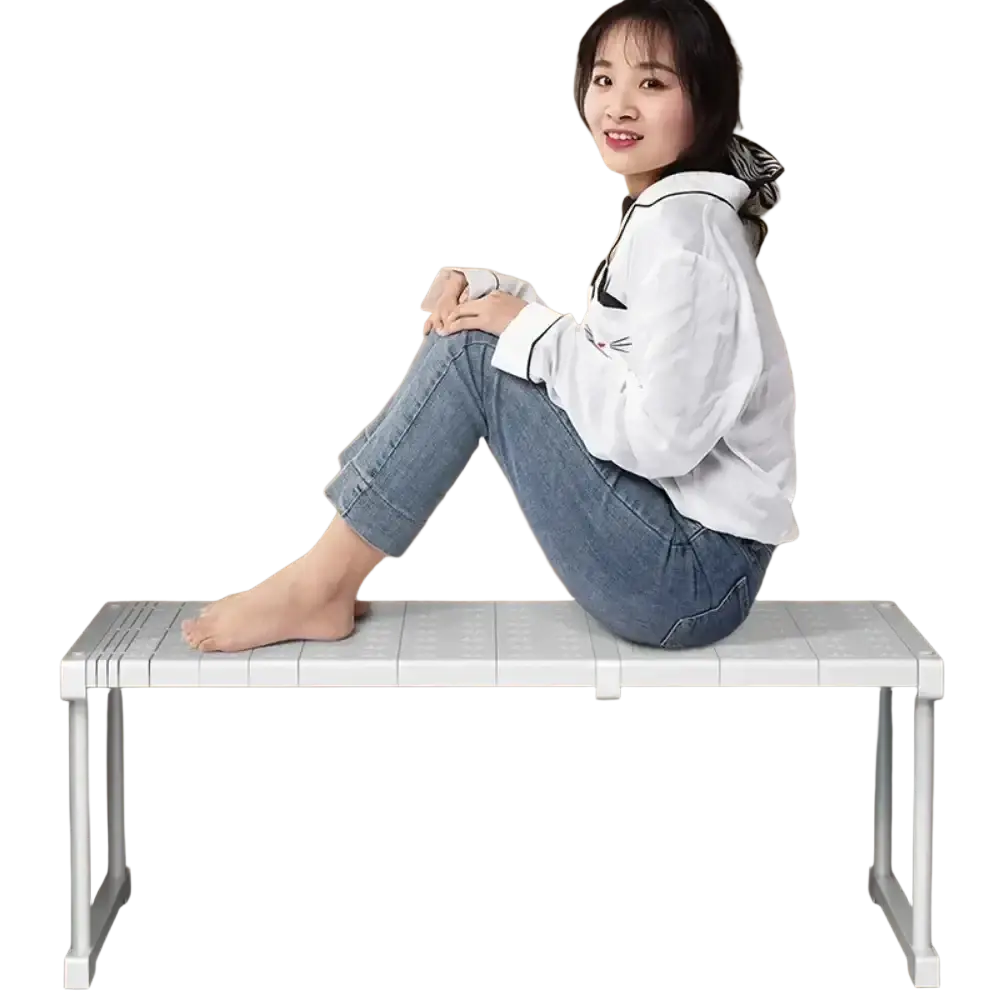 White plastic folding bench with grid-patterned seat and metal legs for wardrobe organizer stackable storage rack use