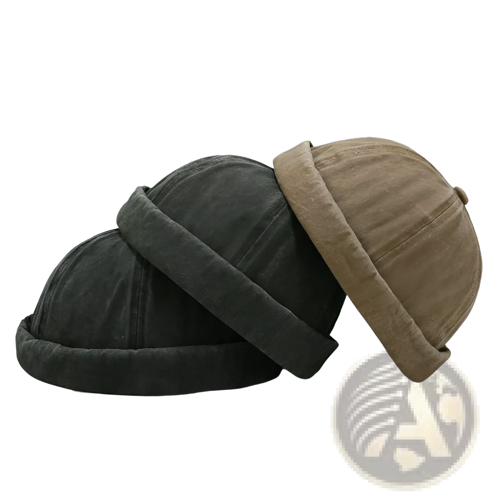 Two washed denim baseball caps in dark gray and tan featuring retro rolled brims and soft textured fabric