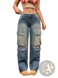 High-waisted washed denim cargo pants with multiple large pockets and a faded distressed finish in blue