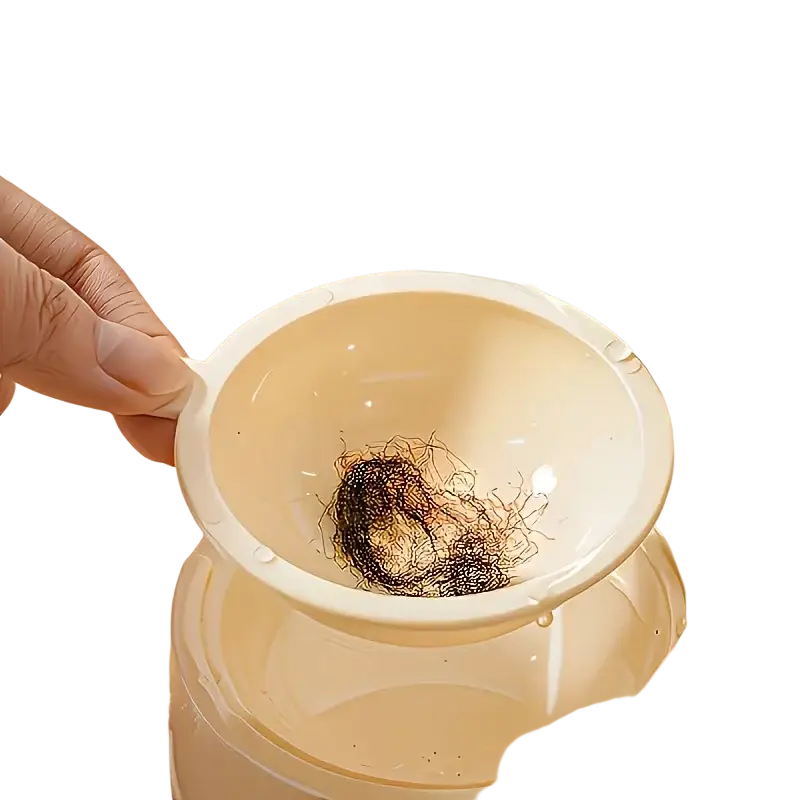 Cream-colored plastic floating hair bowl with handle for catching loose hairs in water dispenser and large pet feeder