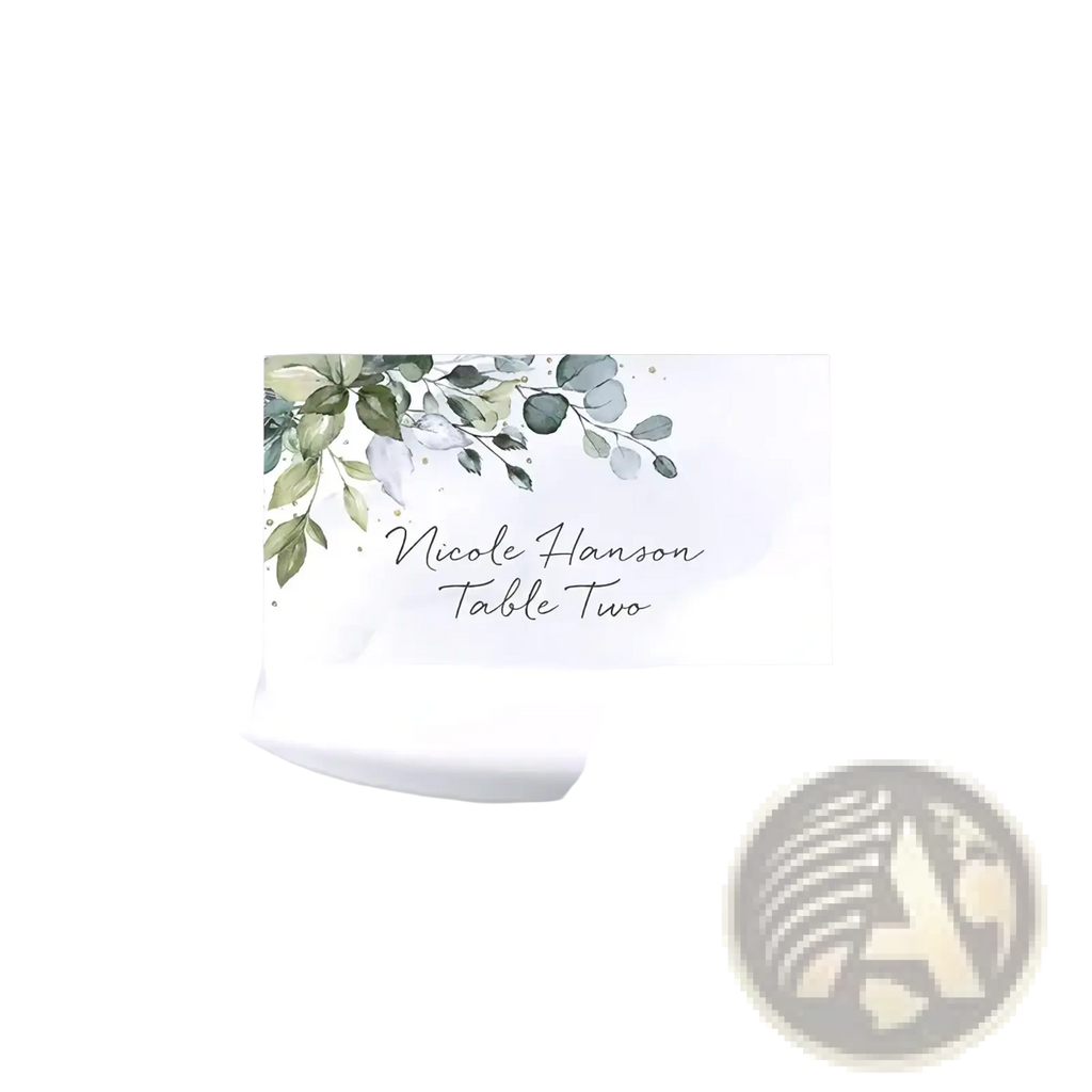 A white rectangular watercolor floral place card with green and gray leaves and elegant black cursive script