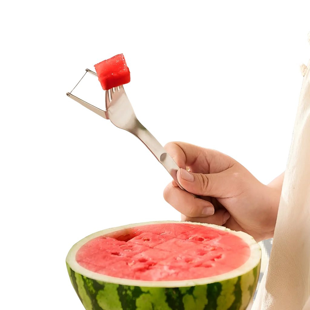 Silver stainless steel 2-in-1 watermelon slicer fork holding a cube of red watermelon flesh for easy cutting