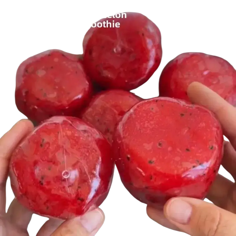 Watermelon slushy squishy stress relief toy with vibrant red glossy smoothie spheres and embedded black seeds