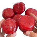 Watermelon slushy squishy stress relief toy with vibrant red glossy smoothie spheres and embedded black seeds