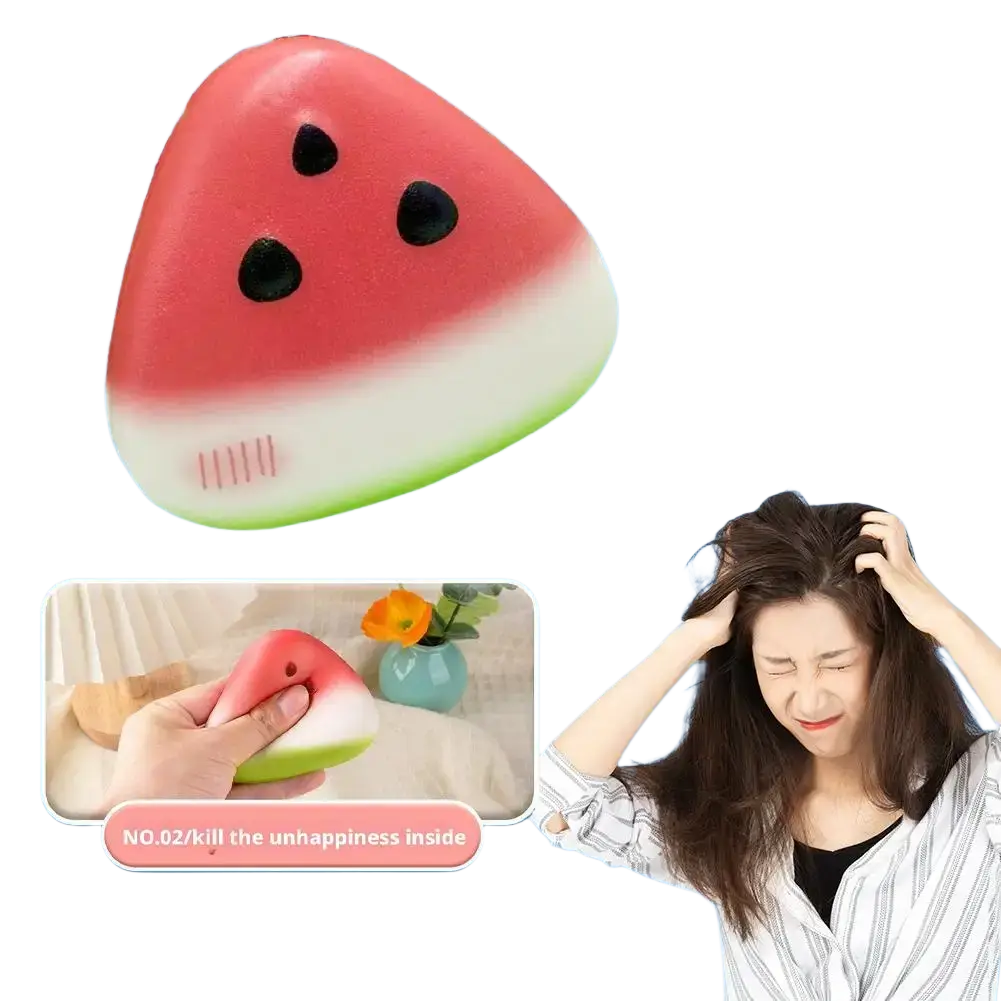 A vibrant red and green watermelon-shaped squeeze toy with black seed details designed as a slow rising stress reliever