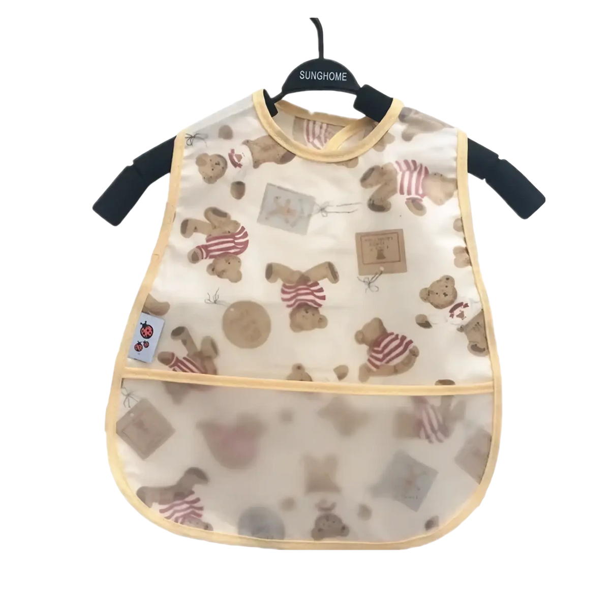 A beige transparent waterproof baby bib made of EVA with brown teddy bears and yellow trim for feeding use