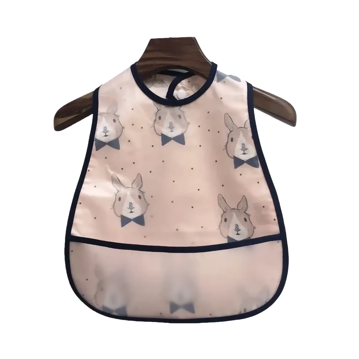 Waterproof baby bib made of eva in pink with navy blue trim and cartoon rabbits for feeding use