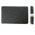 Black non-slip waterproof dog feeding mat and cat litter mat with textured scrubby surface and subtle paw print design