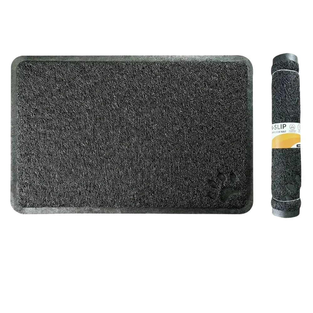 Black non-slip waterproof dog feeding mat and cat litter mat with textured scrubby surface and subtle paw print design