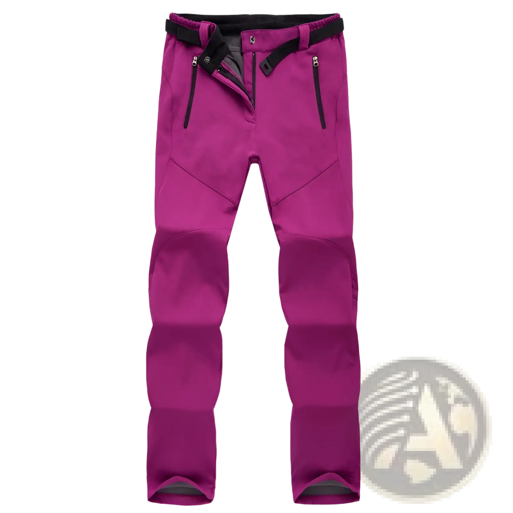 Waterproof fleece ski pants for men and women in vibrant magenta with black zipper accents and matching belt