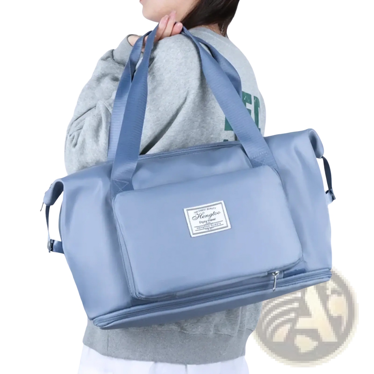 Light blue durable nylon waterproof foldable travel duffel bag with adjustable shoulder straps and front zippered pocket