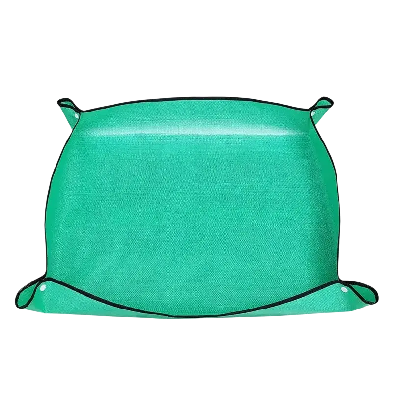 Waterproof gardening repotting mat in green mesh with black trim and reinforced corners measuring 50x50cm