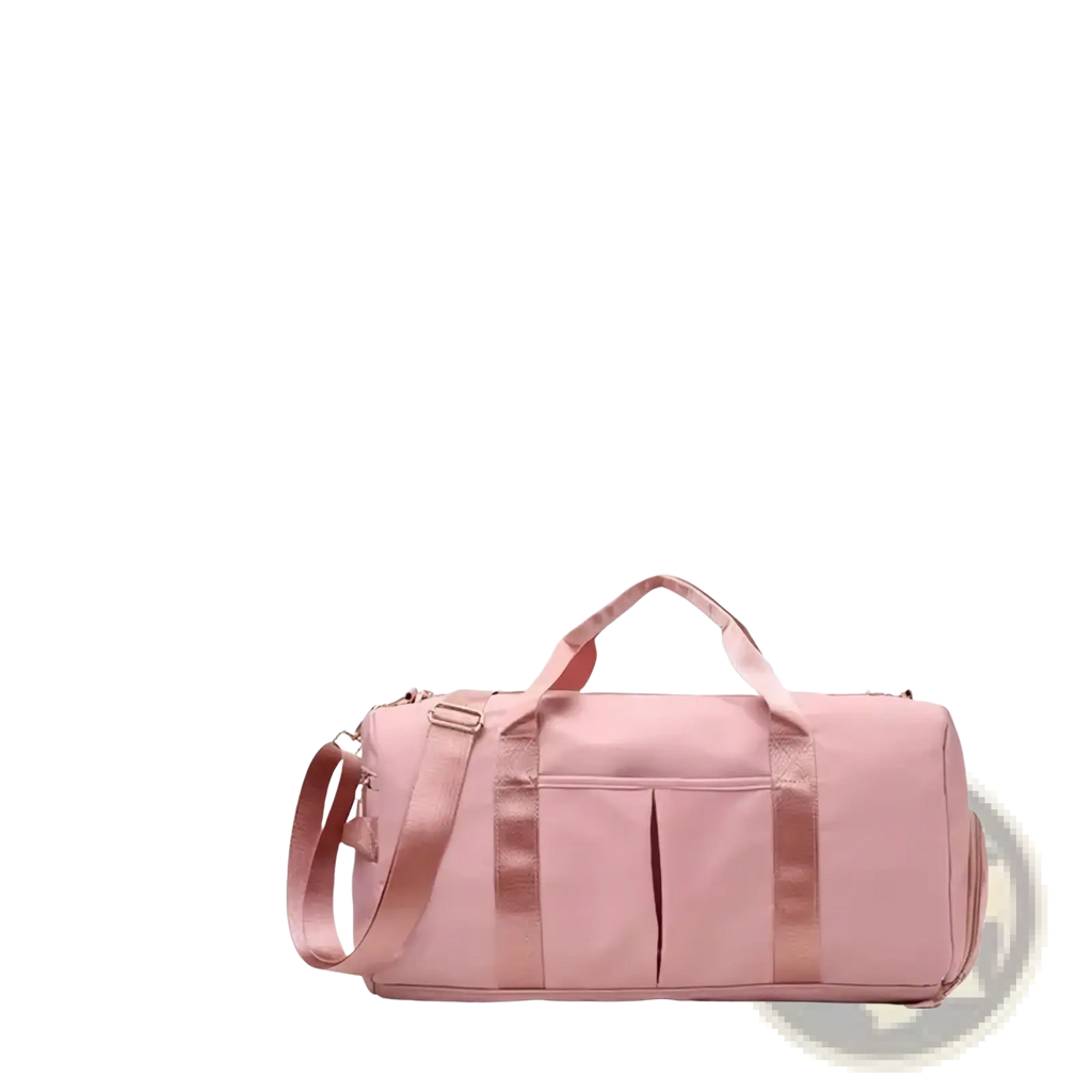 A soft pink waterproof gym bag with shoe compartment reinforced straps and multiple pockets for travel and yoga