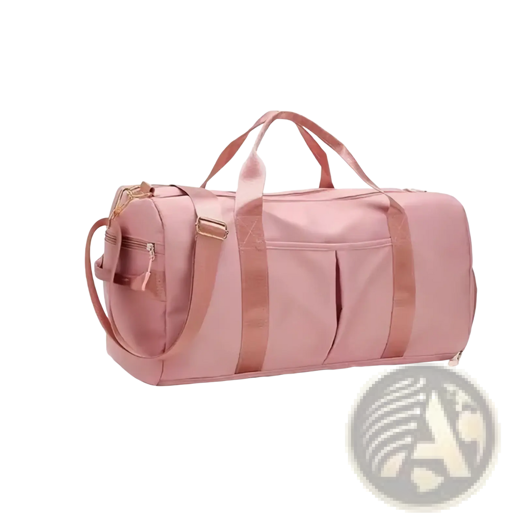 A soft pink waterproof gym bag with matching straps gold-tone zippers and a shoe compartment for easy storage