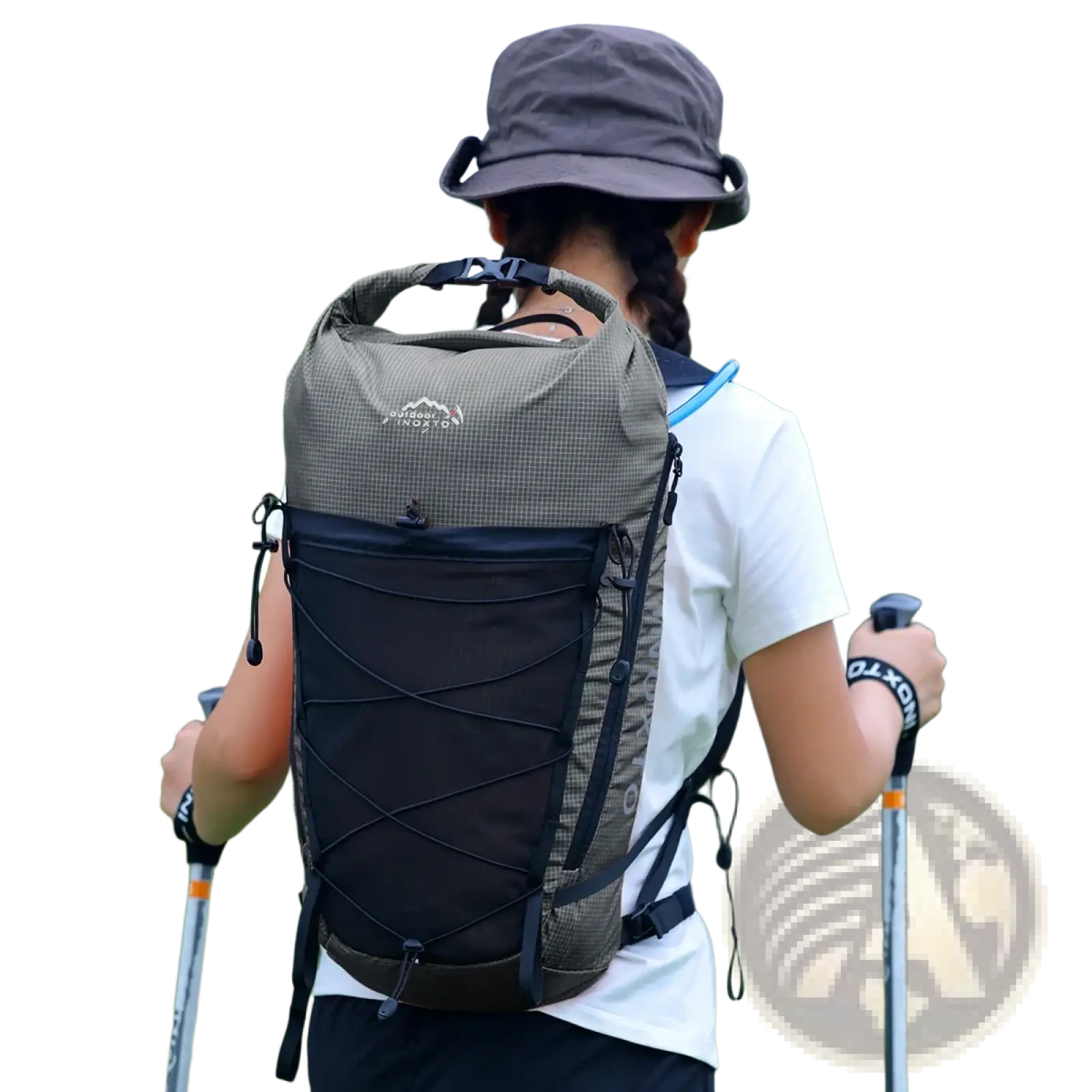 Olive green and black waterproof hiking backpack with grid-patterned upper section and adjustable straps shown from the back side