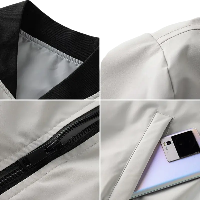 Light gray nylon windbreaker waterproof hiking jacket with black ribbed collar and zipper for autumn use