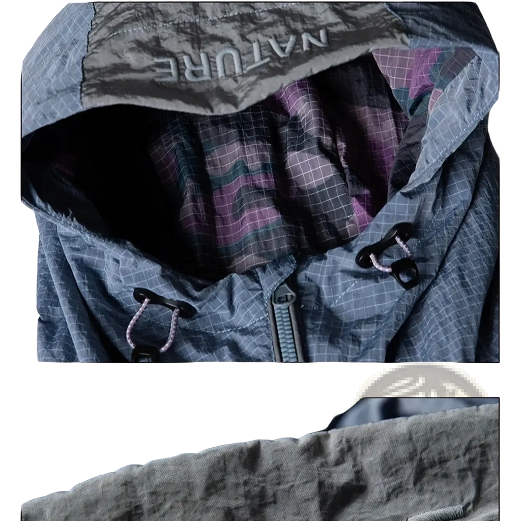 Waterproof hooded trench coat for men in gray with subtle grid pattern, purple green plaid lining, and black drawstring toggles