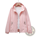 A soft pink waterproof hooded trench coat for women with a shiny nylon finish and two front zippered pockets