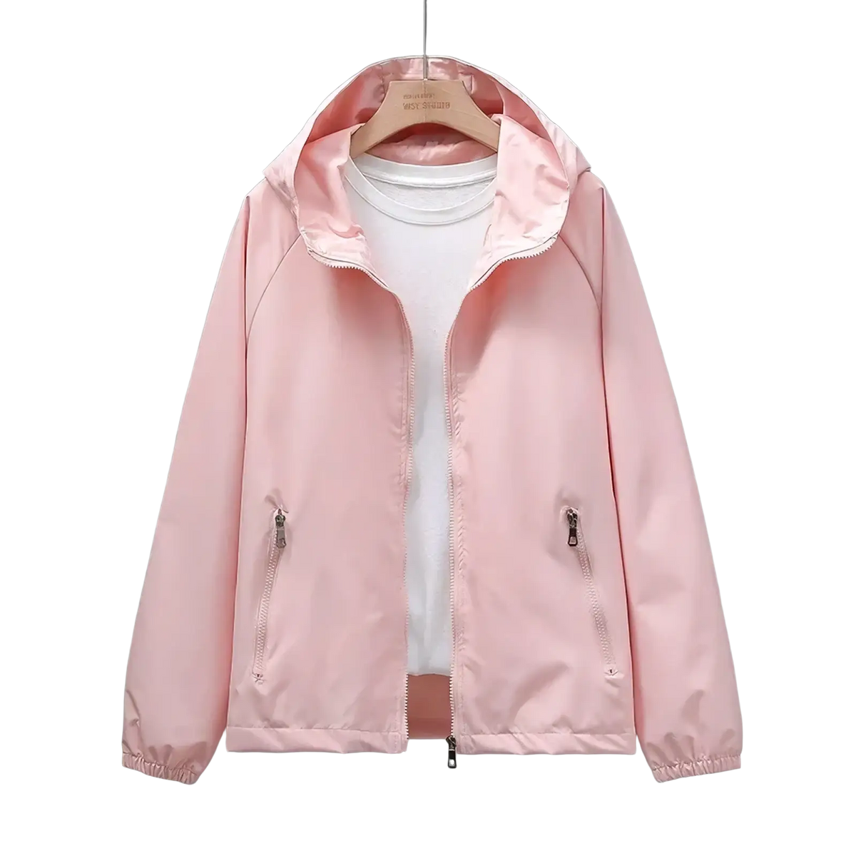 A soft pink waterproof hooded trench coat for women with a shiny nylon finish and two front zippered pockets