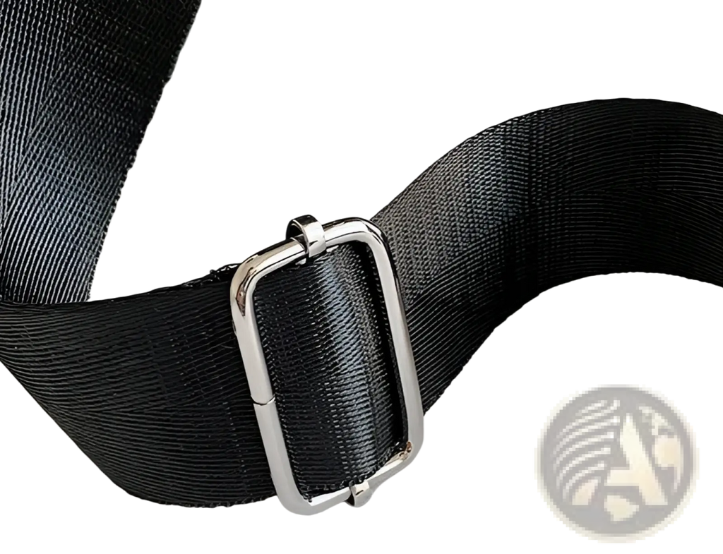 Black woven strap with silver toned rectangular buckle on waterproof large capacity nylon travel backpack with pu leather trim