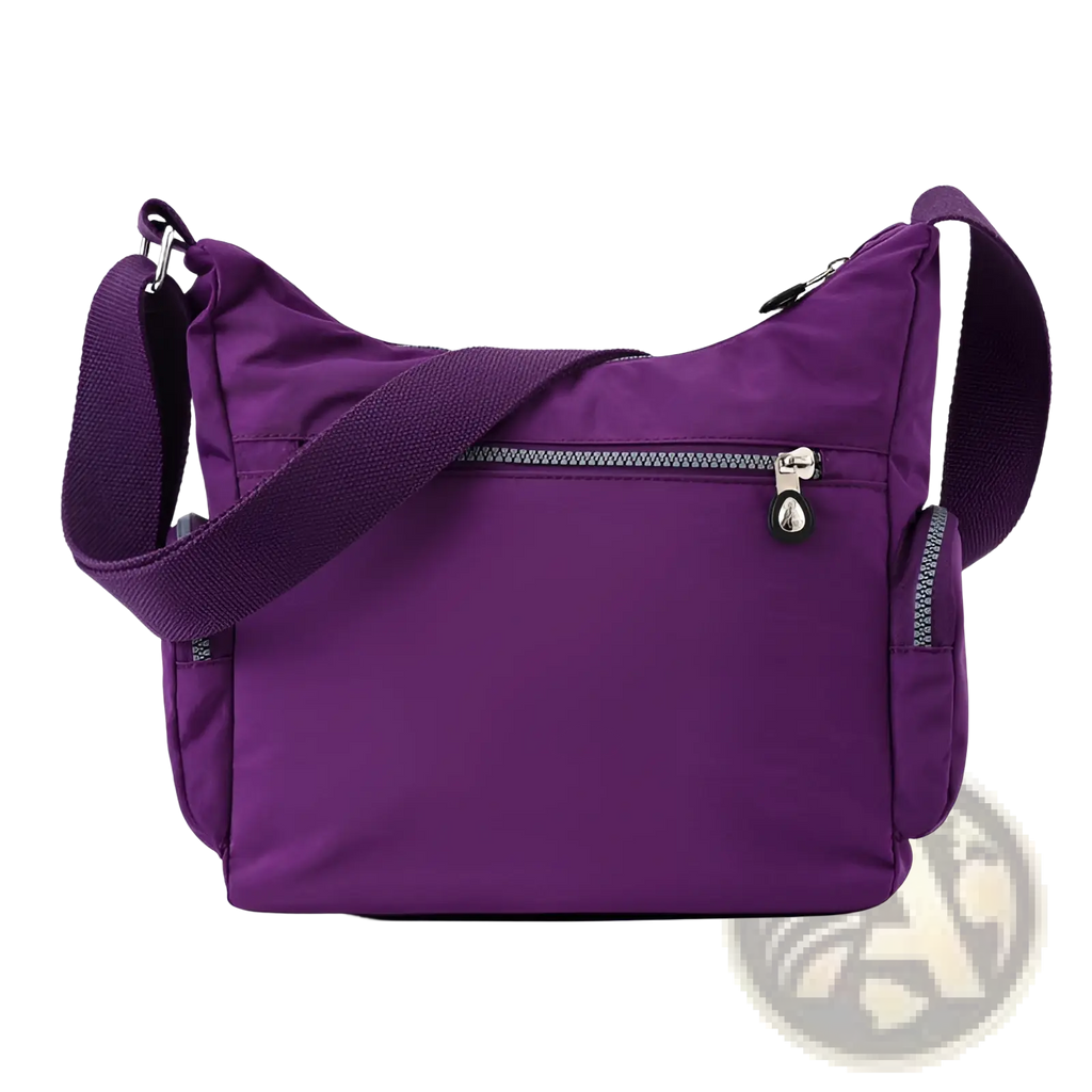 Waterproof multi pocket nylon crossbody shoulder bag in purple with a silver zipper and black pull tab