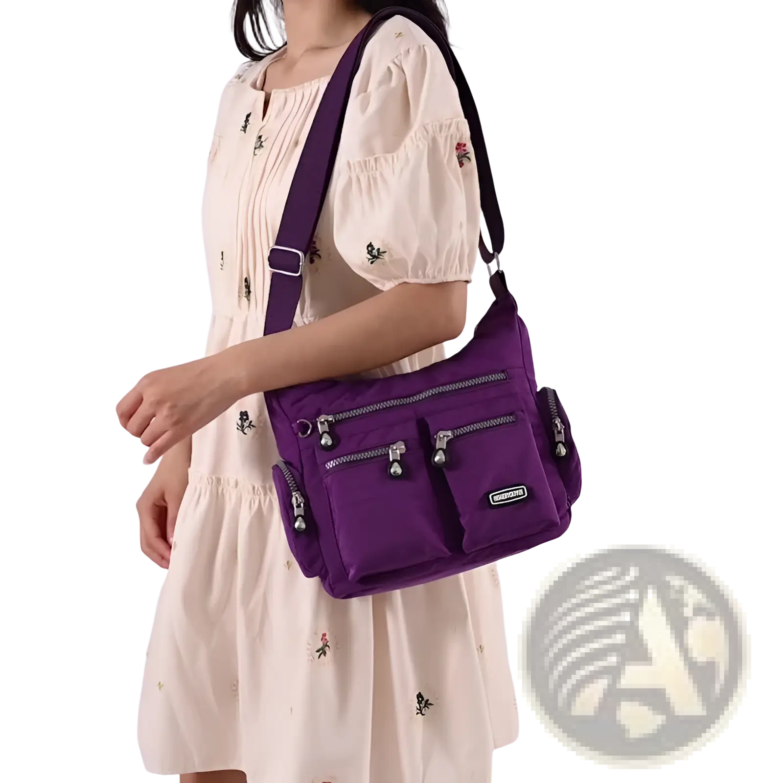 Purple waterproof nylon crossbody shoulder bag with multiple zippered compartments and silver toned hardware