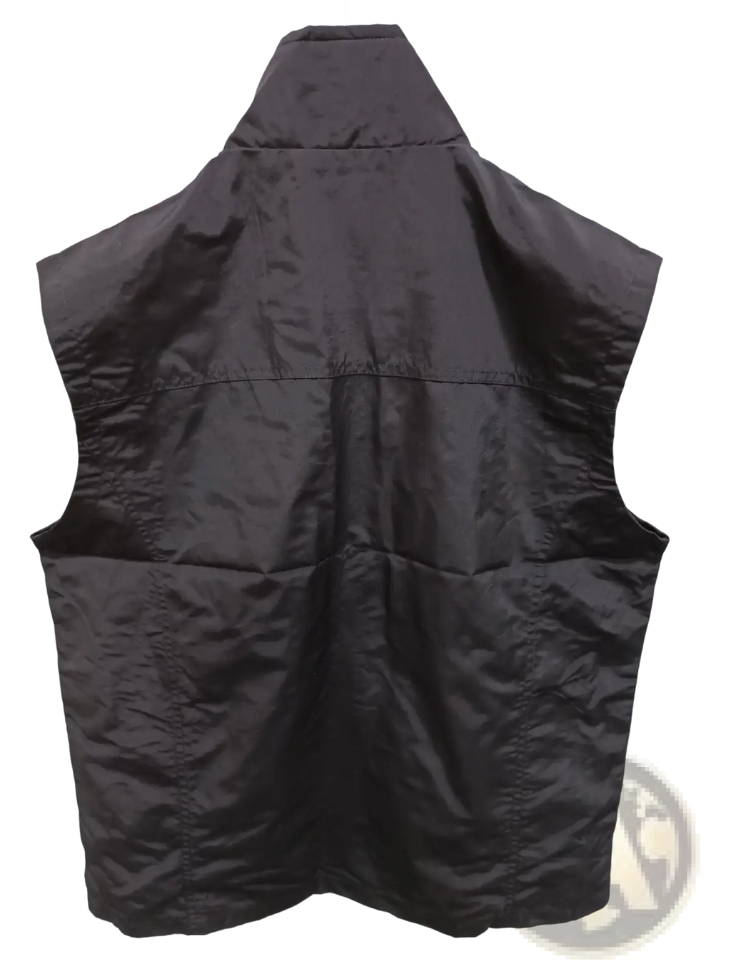 Black quilted waterproof multi pocket utility vest with high collar and stitched paneling for practical outdoor use