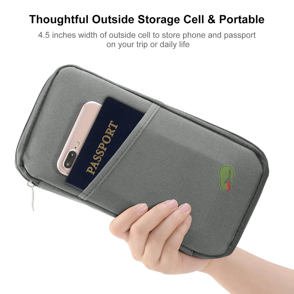 Gray waterproof oxford fabric travel passport and document wallet with zipper closure and outside pocket holding phone and passport