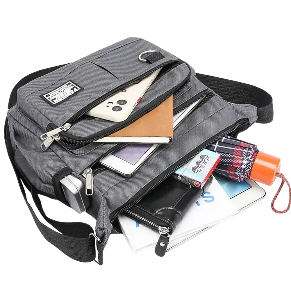 Gray waterproof oxford mens crossbody bag with multiple zippered compartments and black trim for organized carry