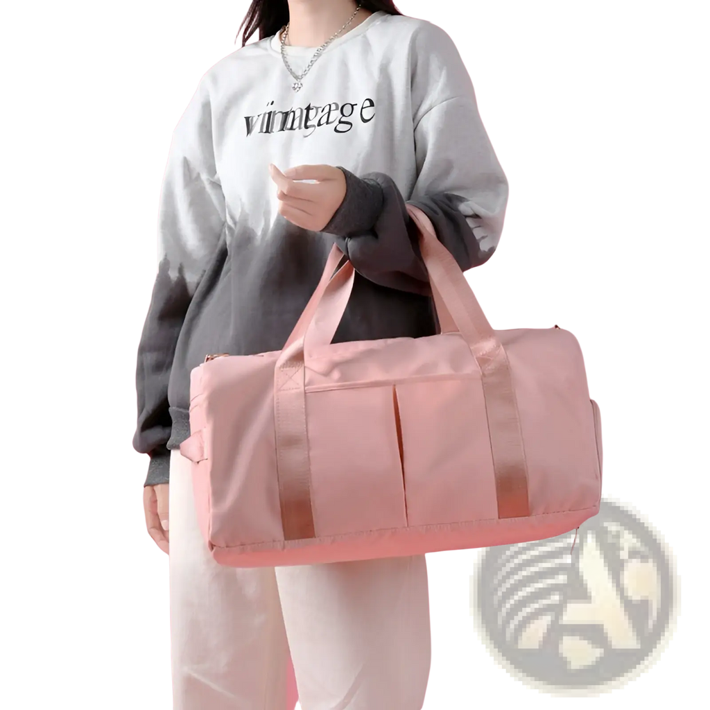 Pink nylon waterproof oxford travel duffel bag with matching handles and front pockets for gym and sports use