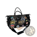 Black waterproof pu leather travel duffel bag with colorful patches and gold lettering for stylish trips