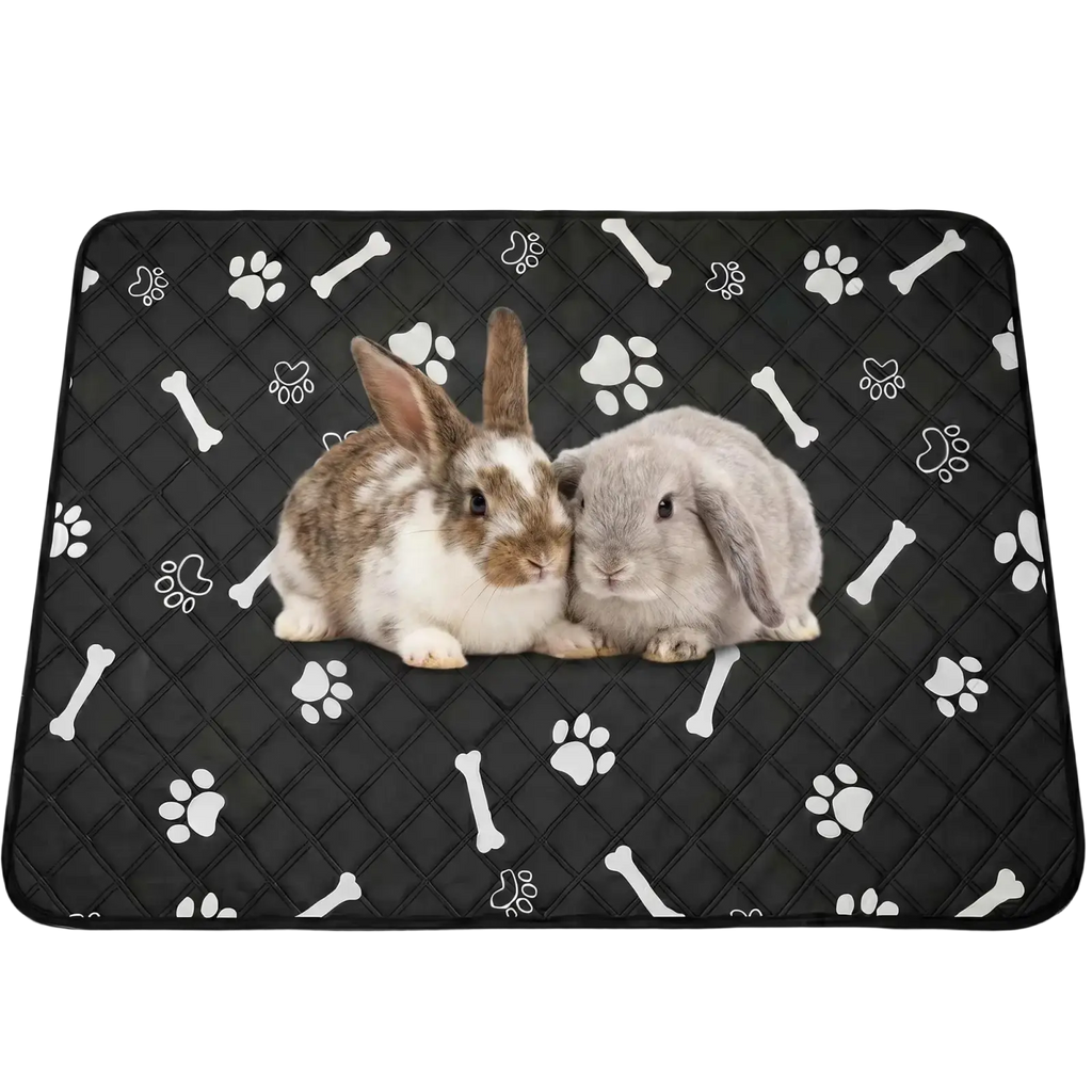 Black waterproof quilted pet bed mat with printed brown and white and gray rabbits and white paw and bone motifs