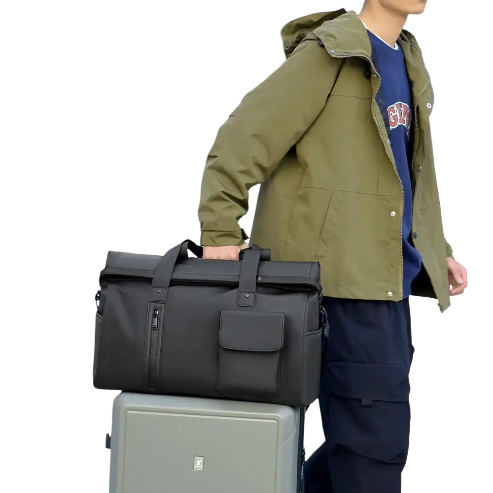 Black waterproof travel duffel bag with durable fabric and reinforced stitching roll-top design for secure storage