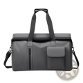 Gray waterproof travel duffel bag with black handles, shoulder strap, front zippered pocket, and leather-like accents