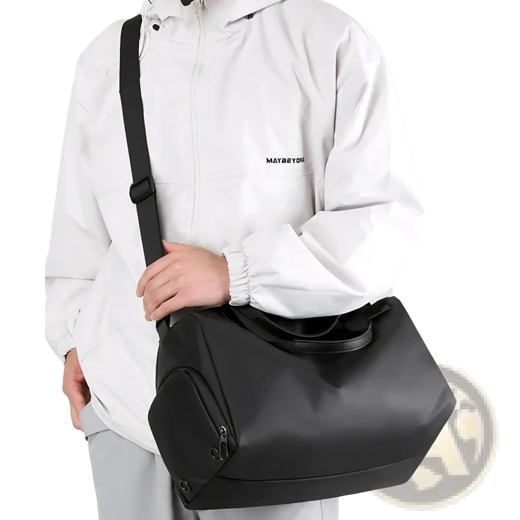 Black sleek modern waterproof travel duffel bag with sturdy shoulder strap and shoe compartment for organized packing