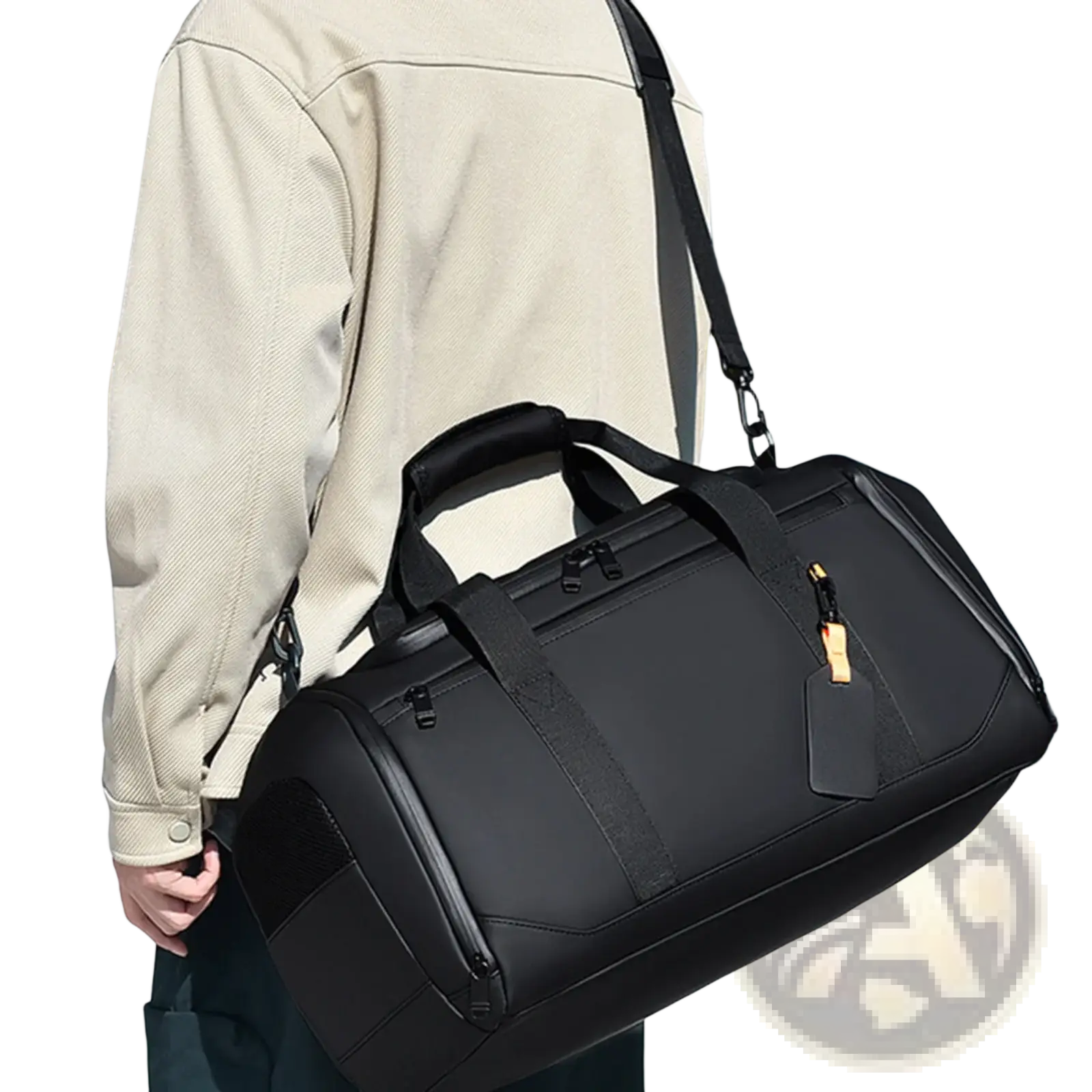 Black waterproof travel duffle bag with reinforced straps and gold-tone zipper pull for large capacity gym organization
