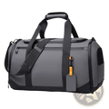 Gray and black waterproof travel duffle bag with large capacity, sturdy handle, adjustable strap, and orange accent tag