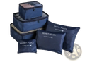 Set of navy blue waterproof travel packing cubes with mesh sides and zipper closures for organized storage