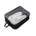 Black transparent waterproof travel shoe bag with zipper closure and handle for organized storage and easy carrying