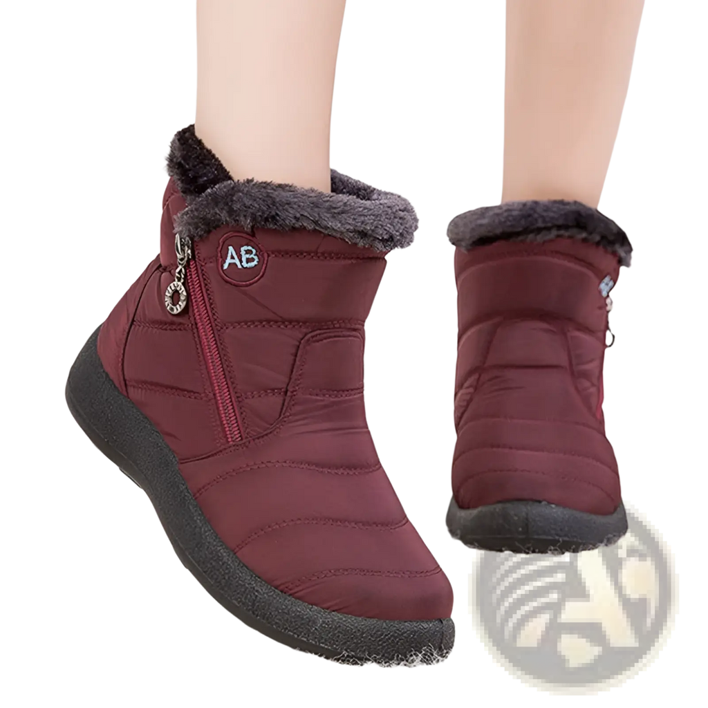 Maroon waterproof winter snow boots with quilted design, gray faux fur trim, and black rubber sole for cold weather