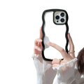 A sleek transparent wavy border iPhone case with bold black edges and precise camera cutout shown from the back side