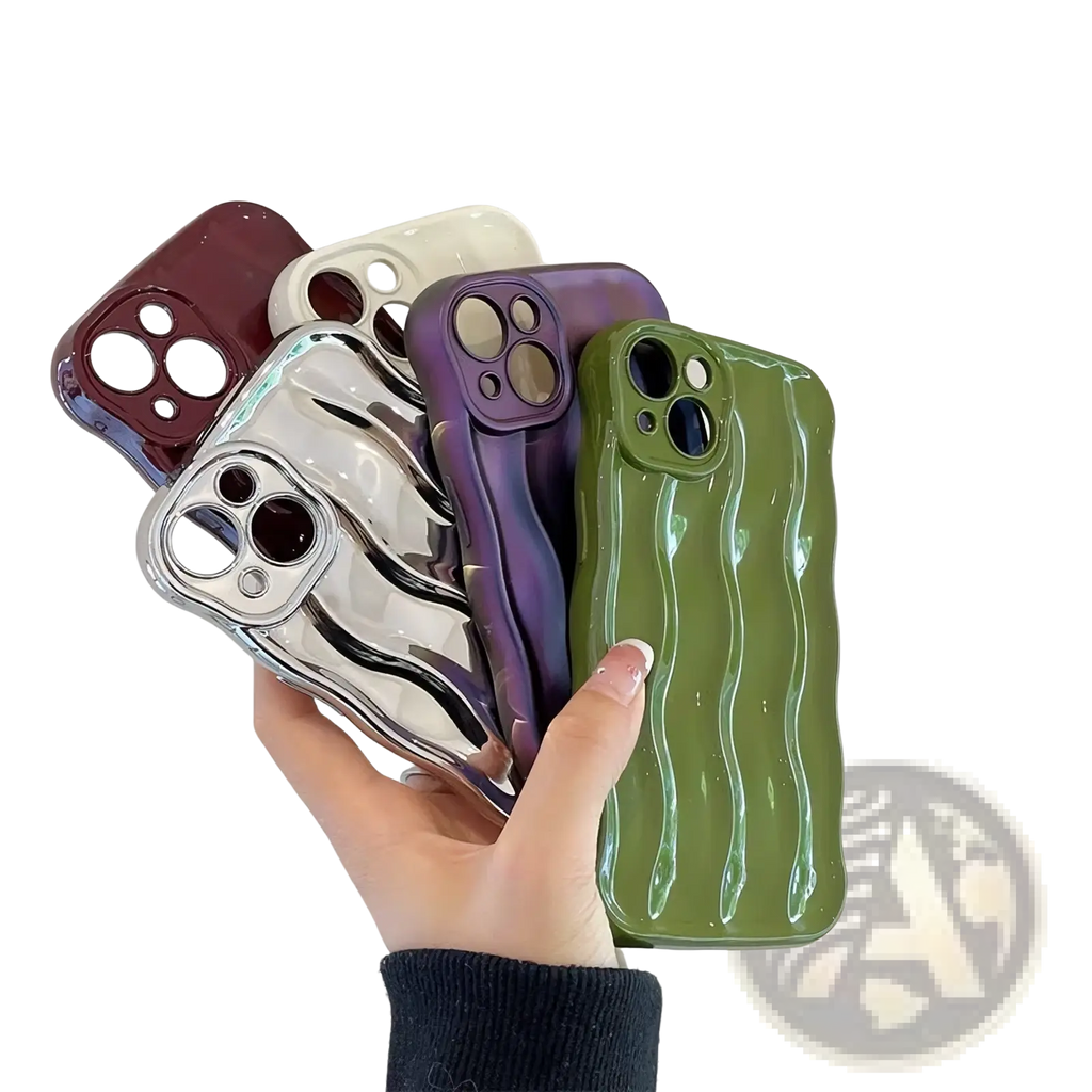 A hand holds glossy wavy silicone iPhone cases in maroon white silver purple and green showing the back side