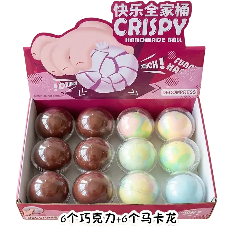 A pink and white box containing six chocolate and six marbled wax skin squishy stress ball fidget toys individually wrapped