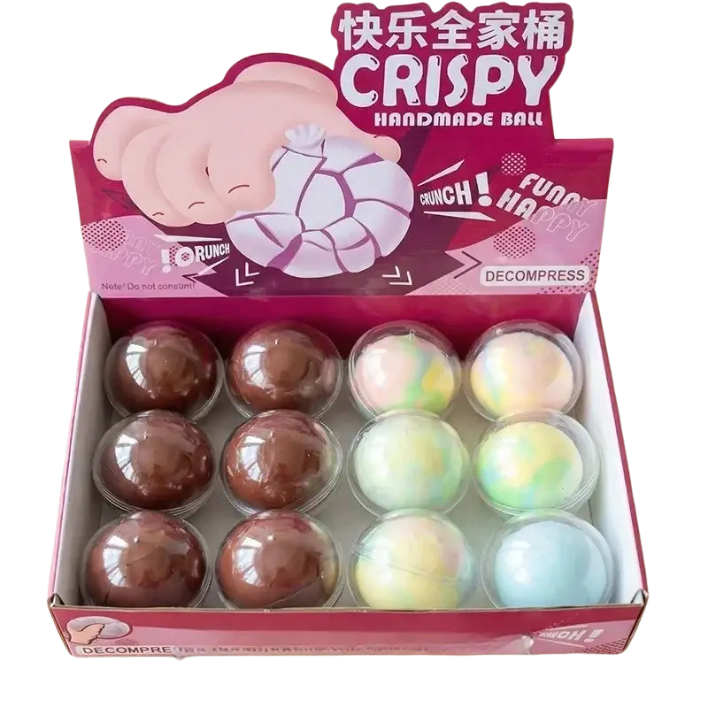 Pink and white cardboard box containing twelve colorful clear plastic-capped wax skin squishy stress ball fidget toys